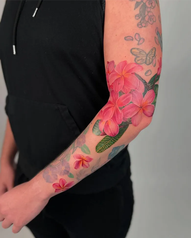Full Sleeve Plumeria Tattoo