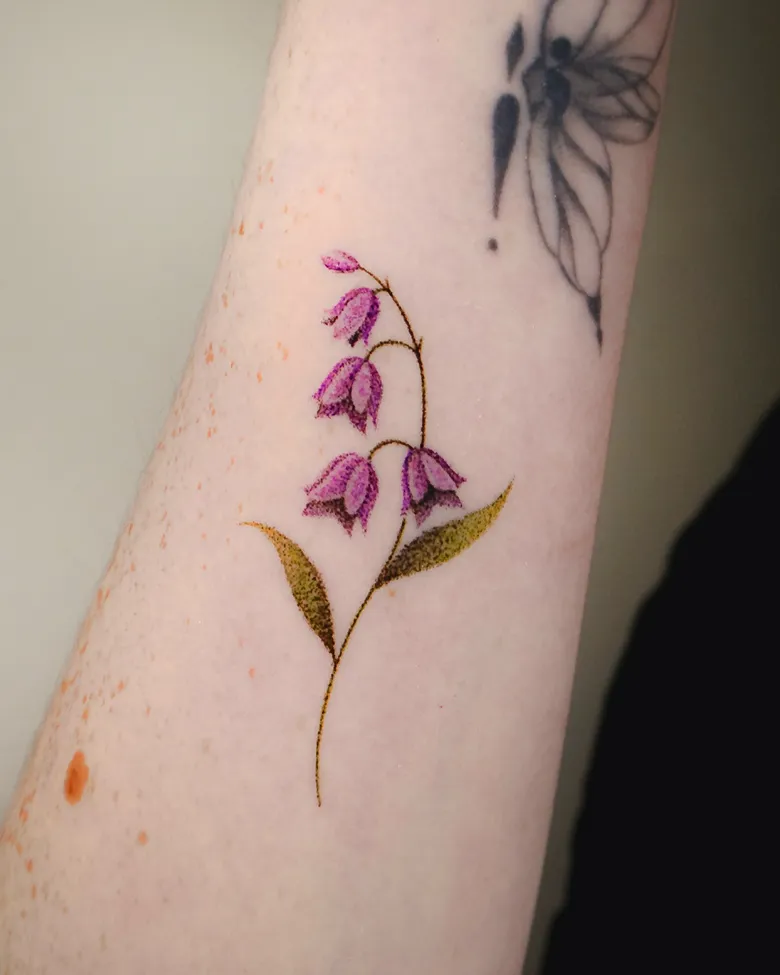 Handpoked Purple Lily of the Valley Tattoo