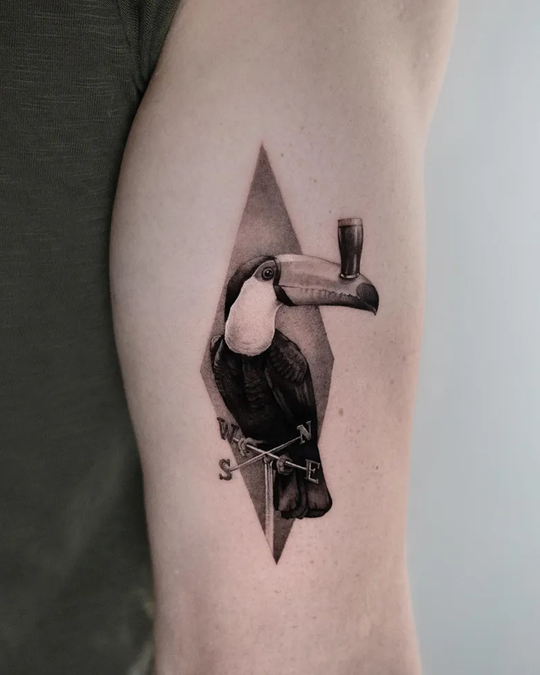 Intricate Geometric Toucan Tattoo