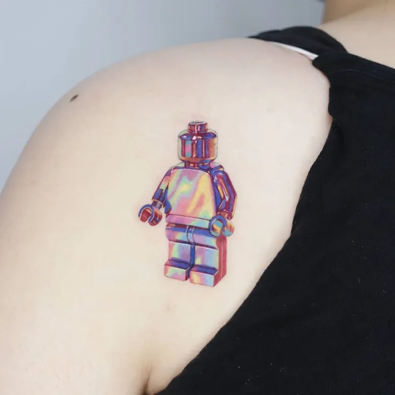 Iridescent Chrome Lego Tattoo Design