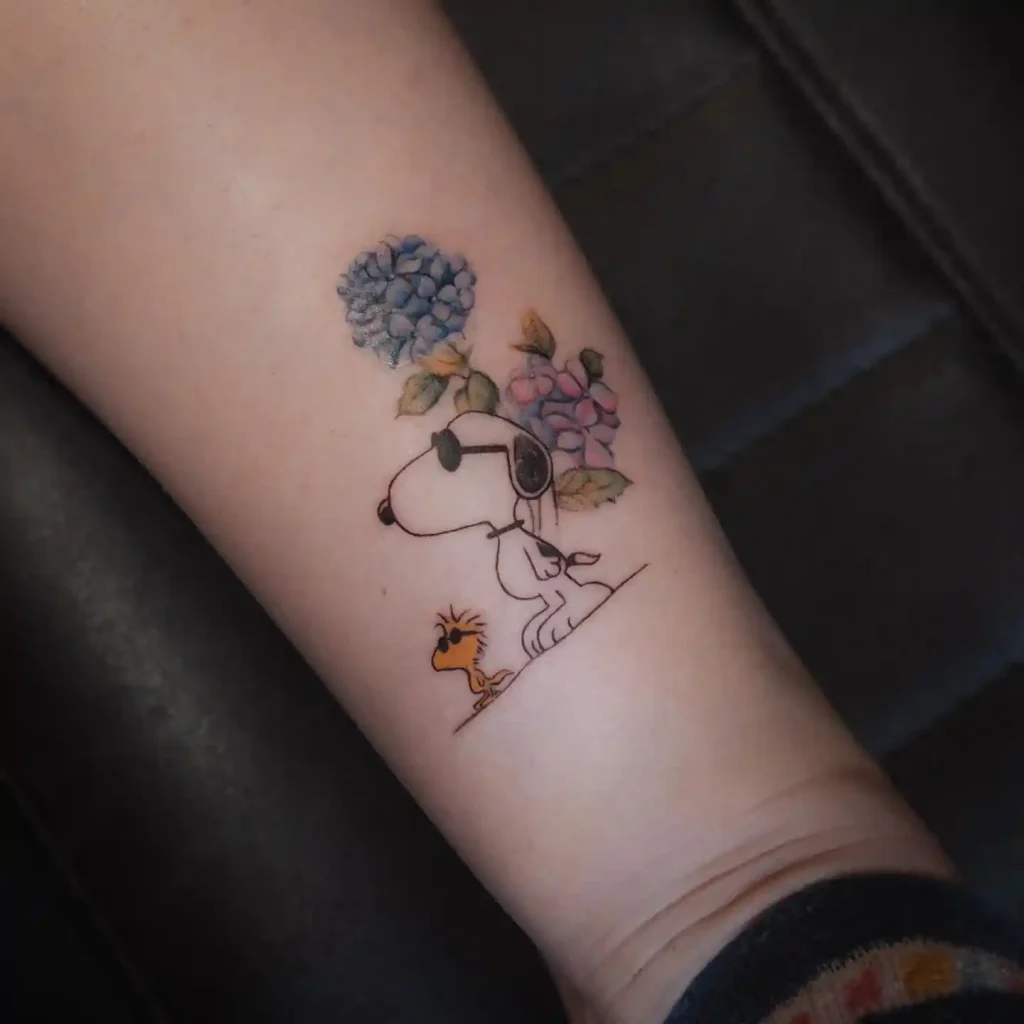 Joe Cool Snoopy with Hydrangeas on Inner Forearm