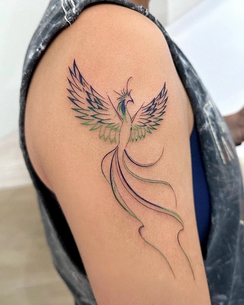 Joyful Minimal Phoenix Tattoo With Colored Wings