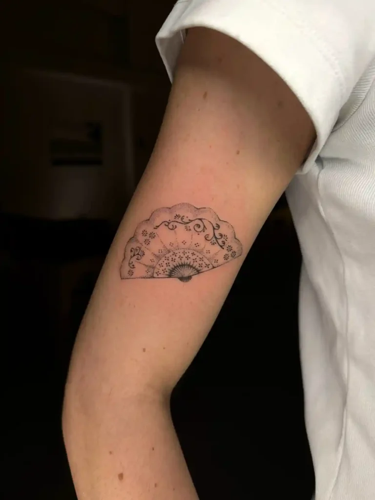 Lace Fan Tattoo on Inner Upper Arm