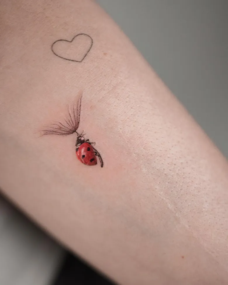 Ladybug on Dandelion Stem Tattoo