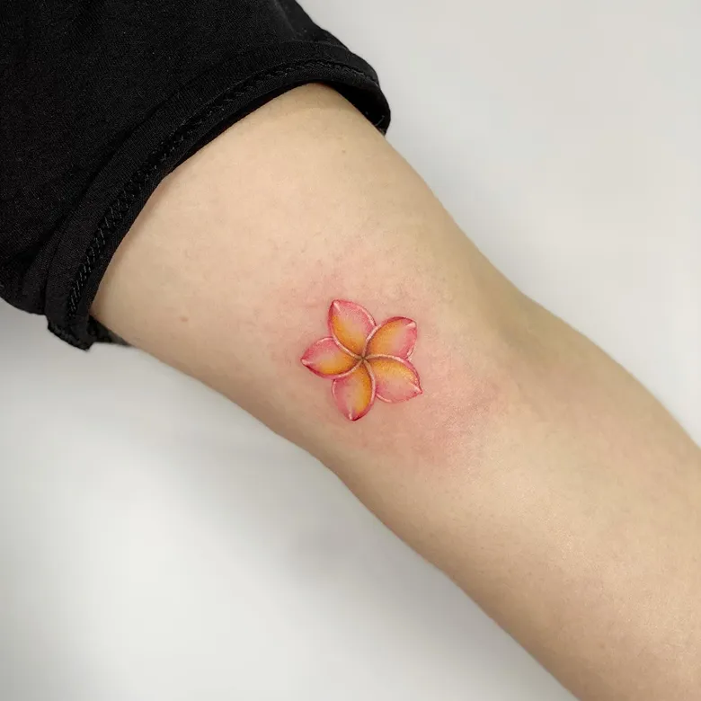 Micro Color Plumeria Inner Arm Tattoo