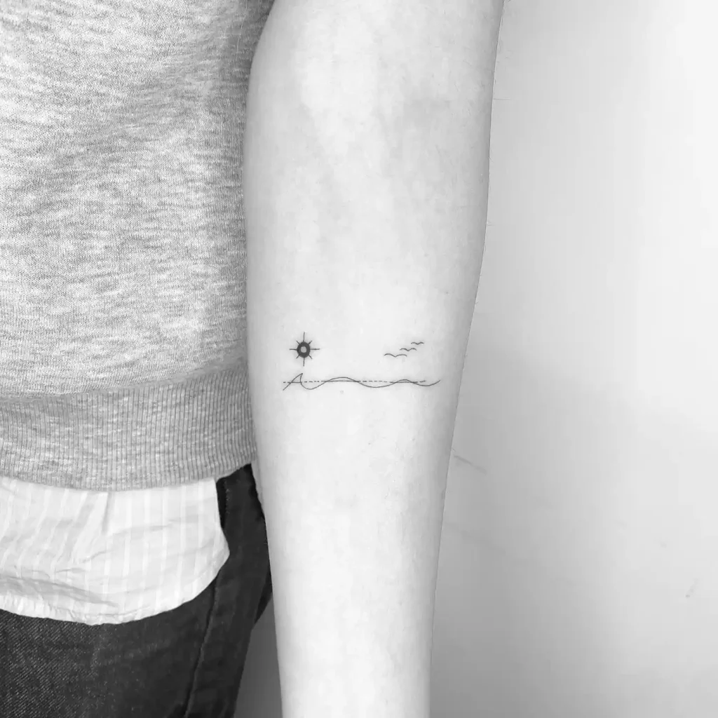 Minimalist Ocean Horizon on Inner Forearm