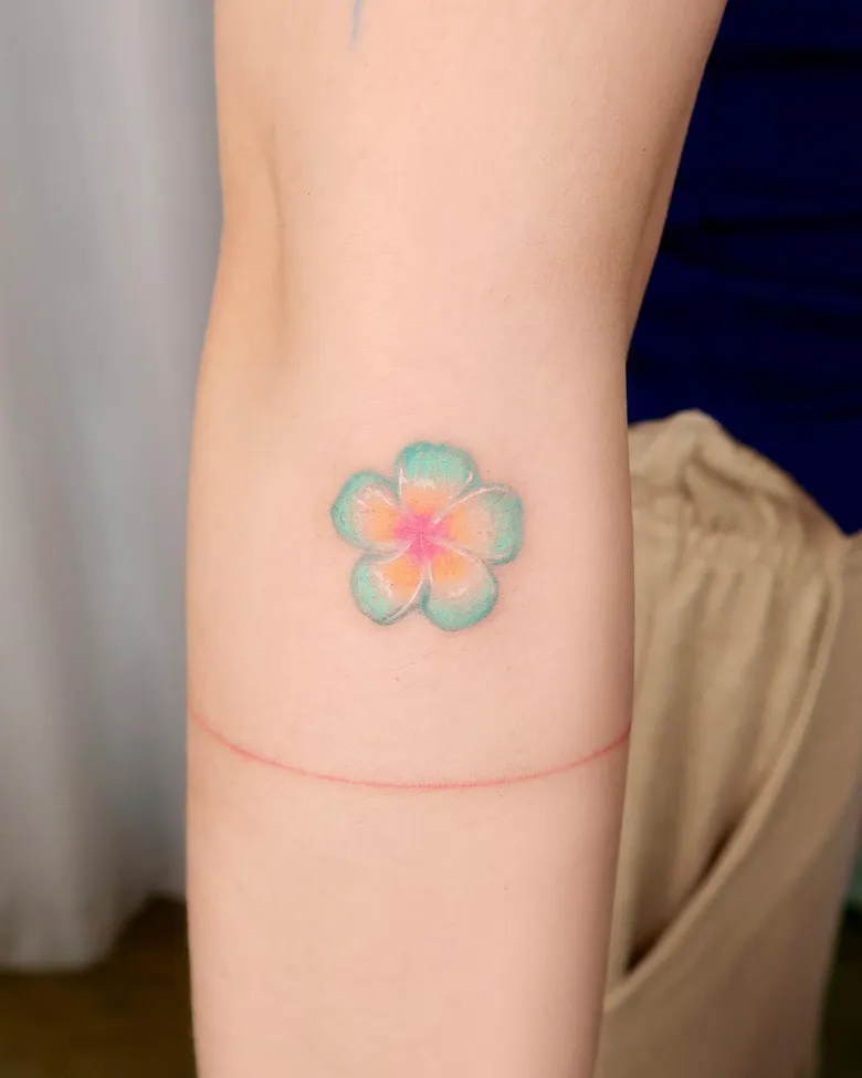 Pastel Minimal Plumeria Inner Arm Tattoo