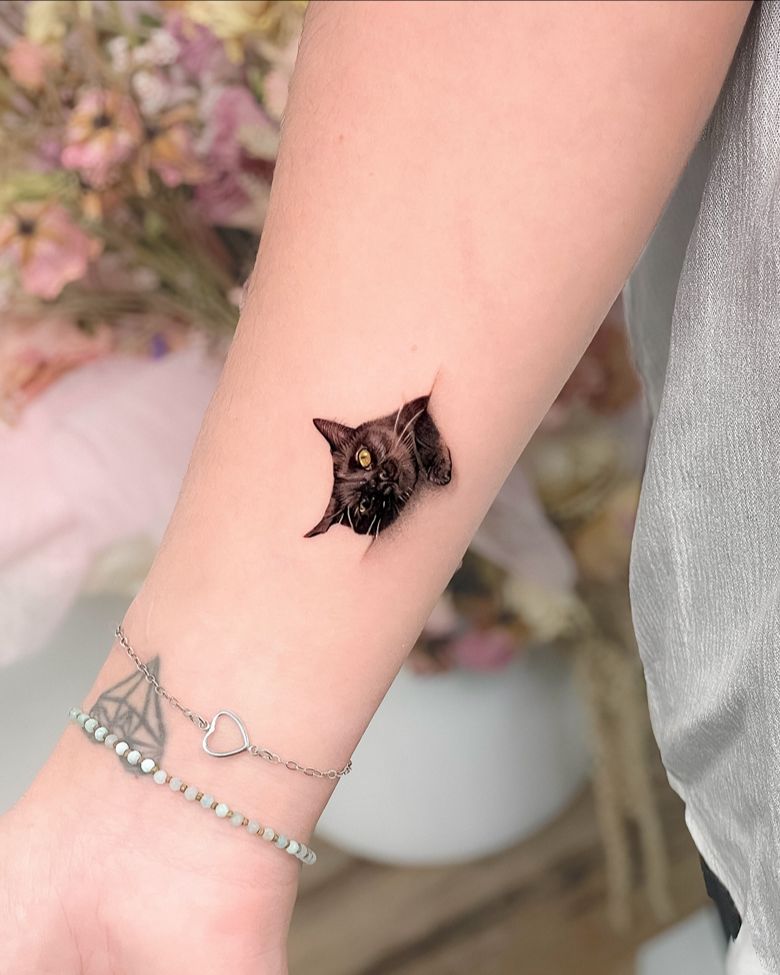 Peeking Realistic Black Cat Wrist Tattoo