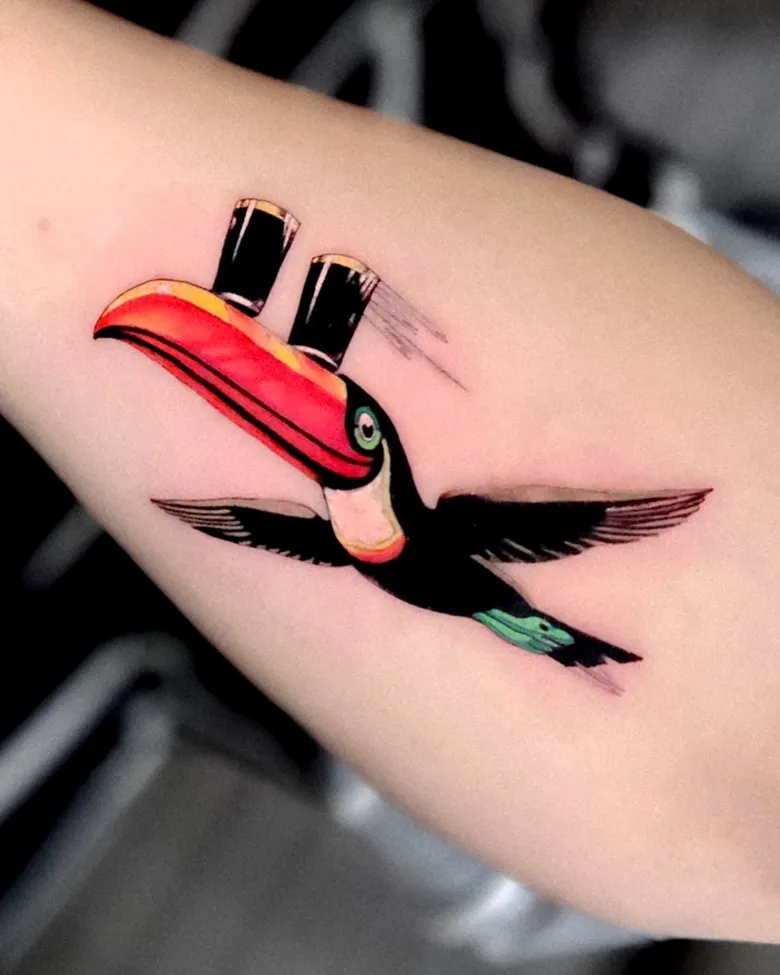 Playful Toucan With Guinness Pint Tattoo