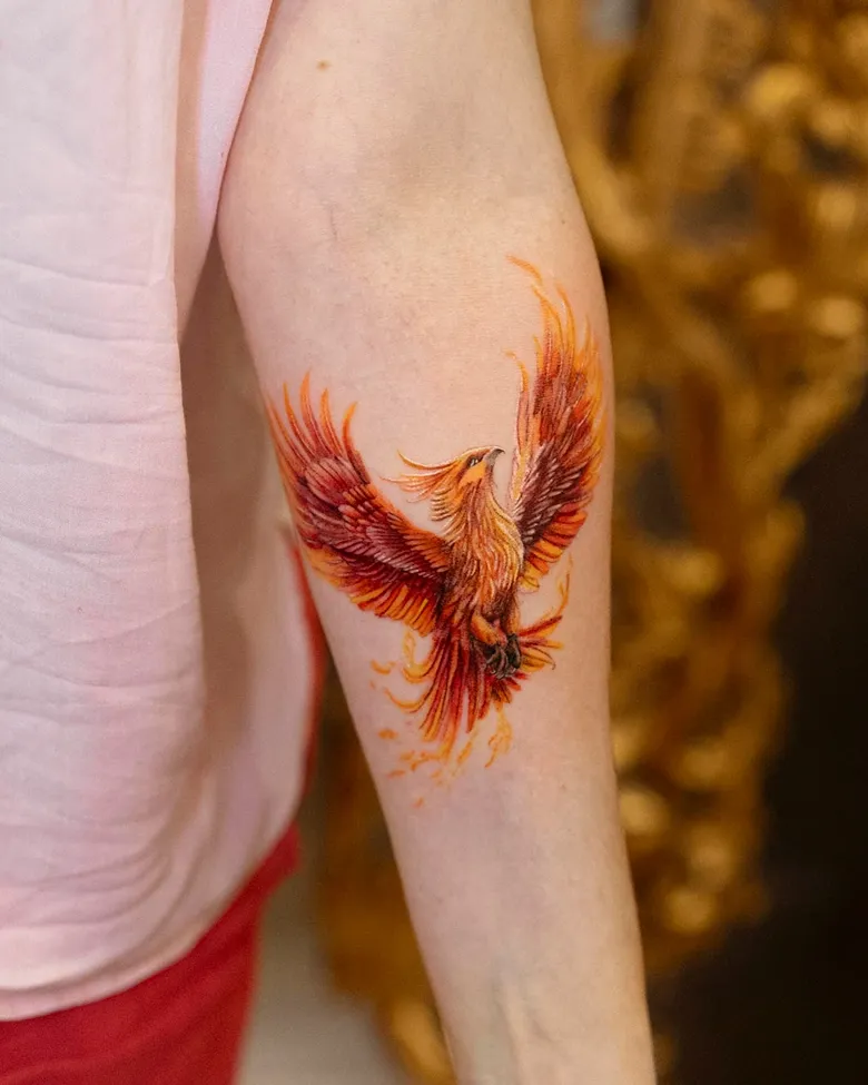 Powerful Realistic Phoenix Tattoo Rising From Flames