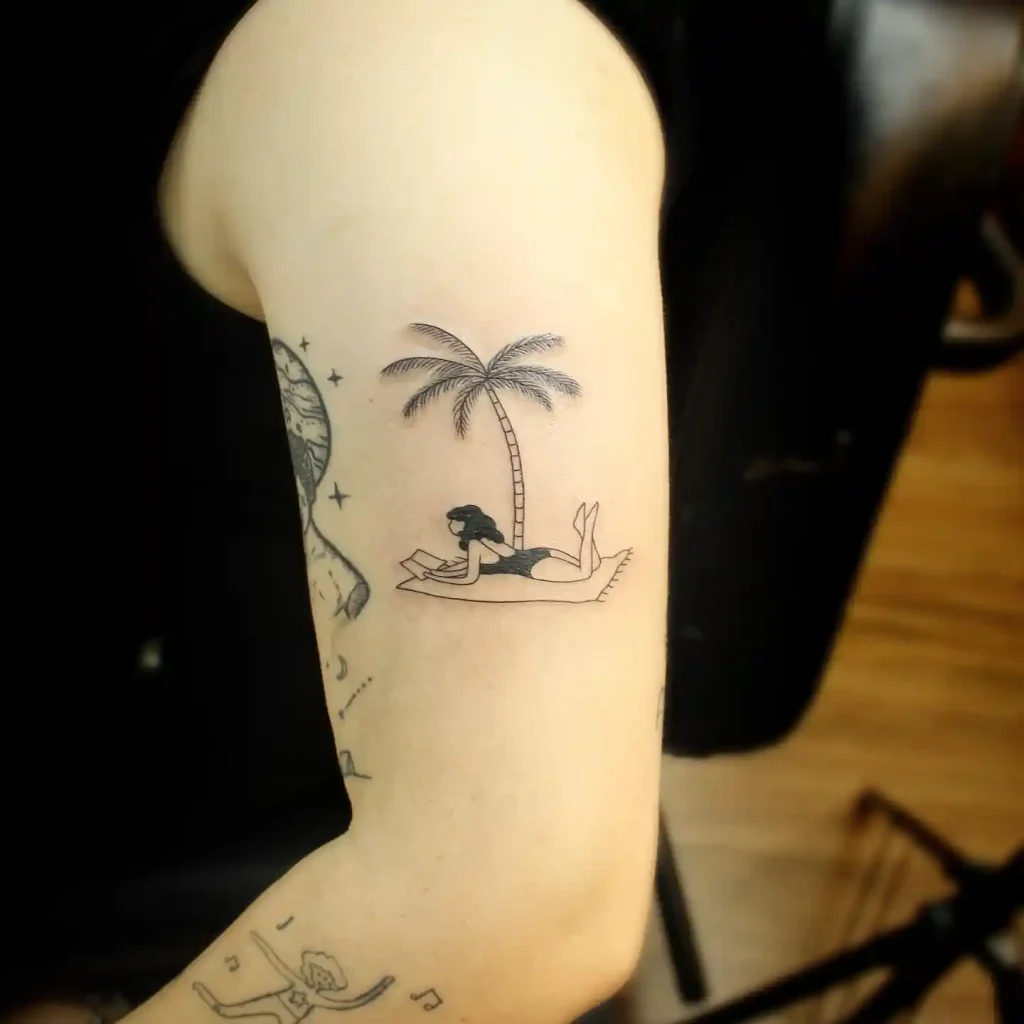 Reading Under Palm Tree on Inner Arm