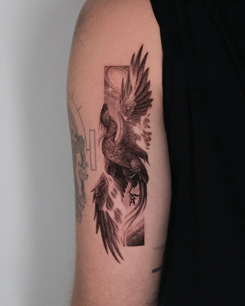Realistic Blackwork Phoenix Arm Tattoo