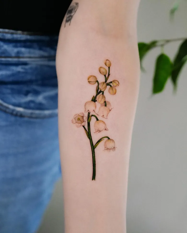 Realistic Color Lily of the Valley Tattoo