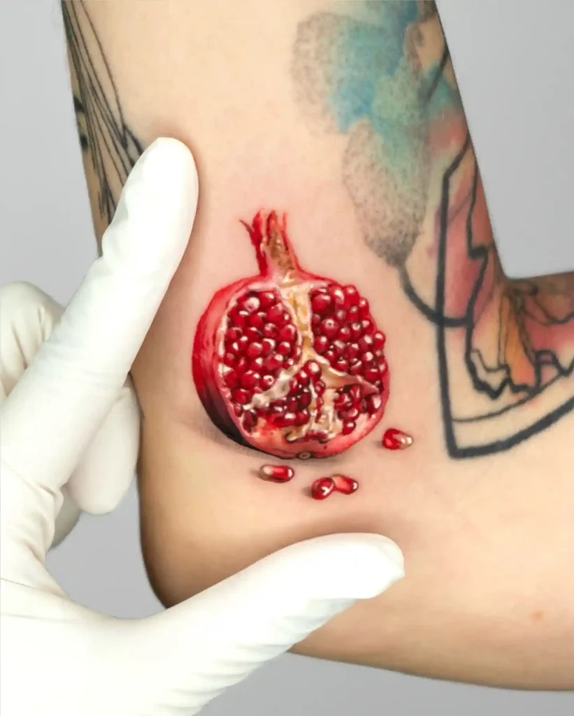 Realistic Cut Open Pomegranate on Ankle