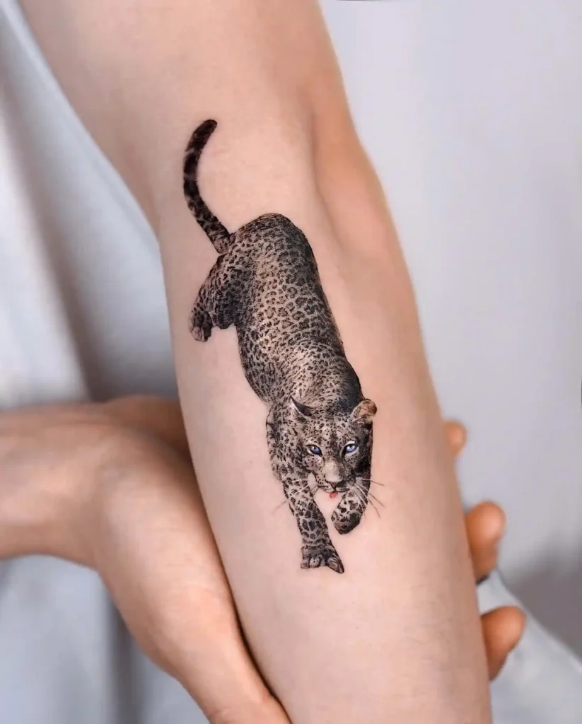 Realistic Prowling Jaguar on Inner Forearm