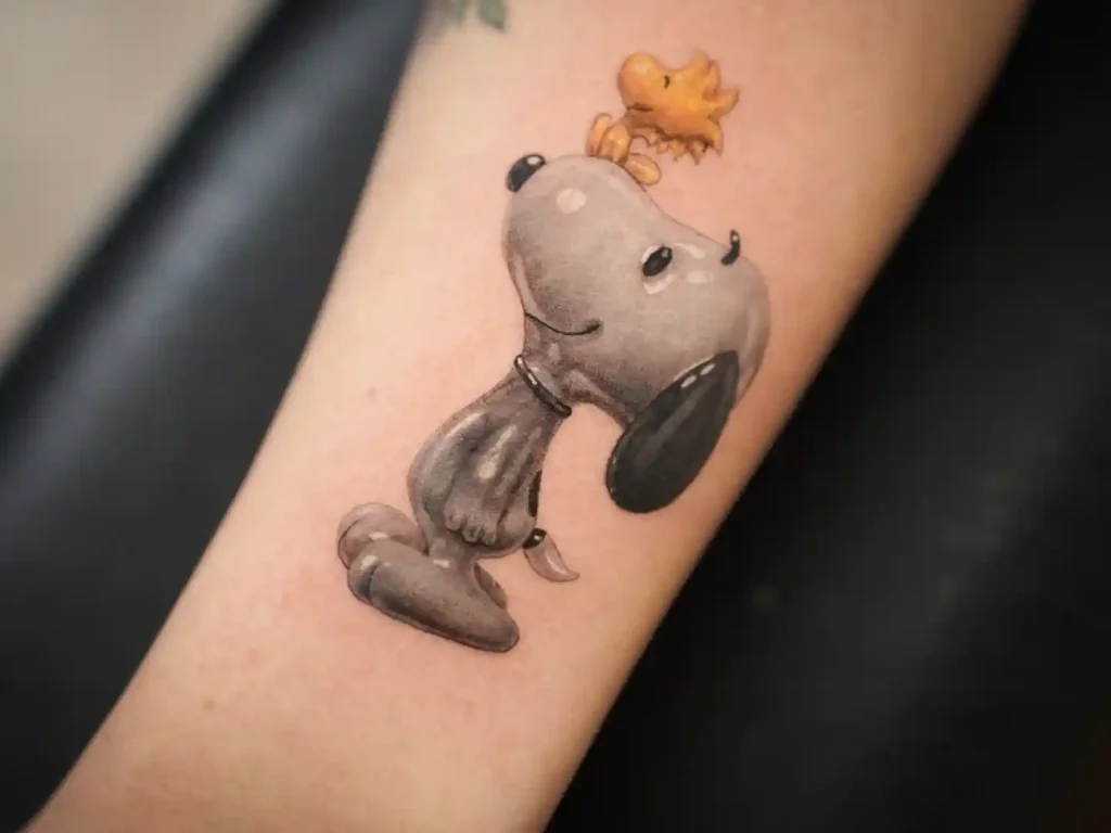 Realistic Snoopy and Woodstock on Forearm