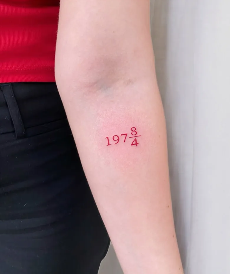Red Ink Fraction Style Birth Year Tattoo