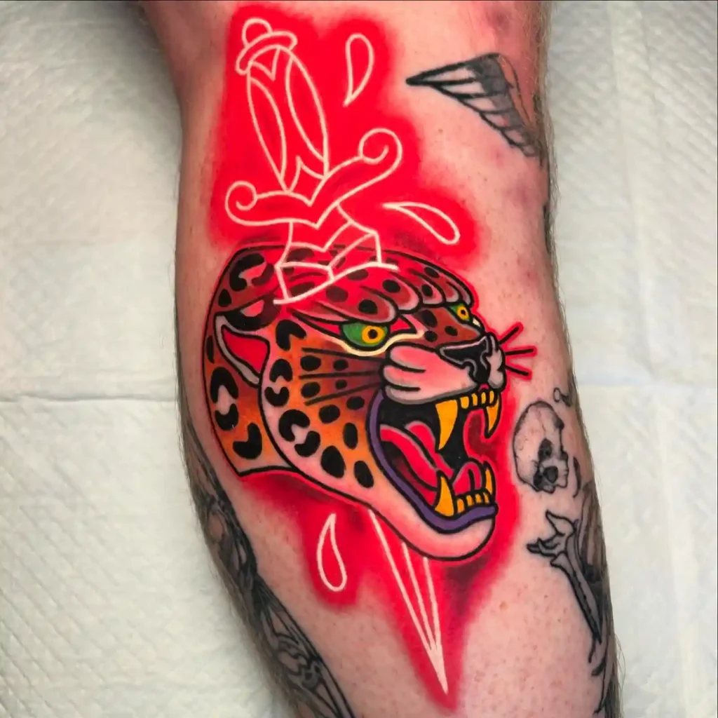 Roaring Jaguar with Dagger on Lower Leg