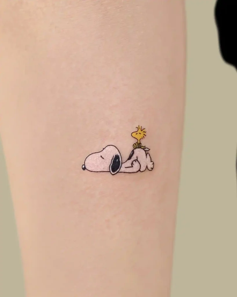 Sleeping Snoopy and Woodstock on Inner Arm