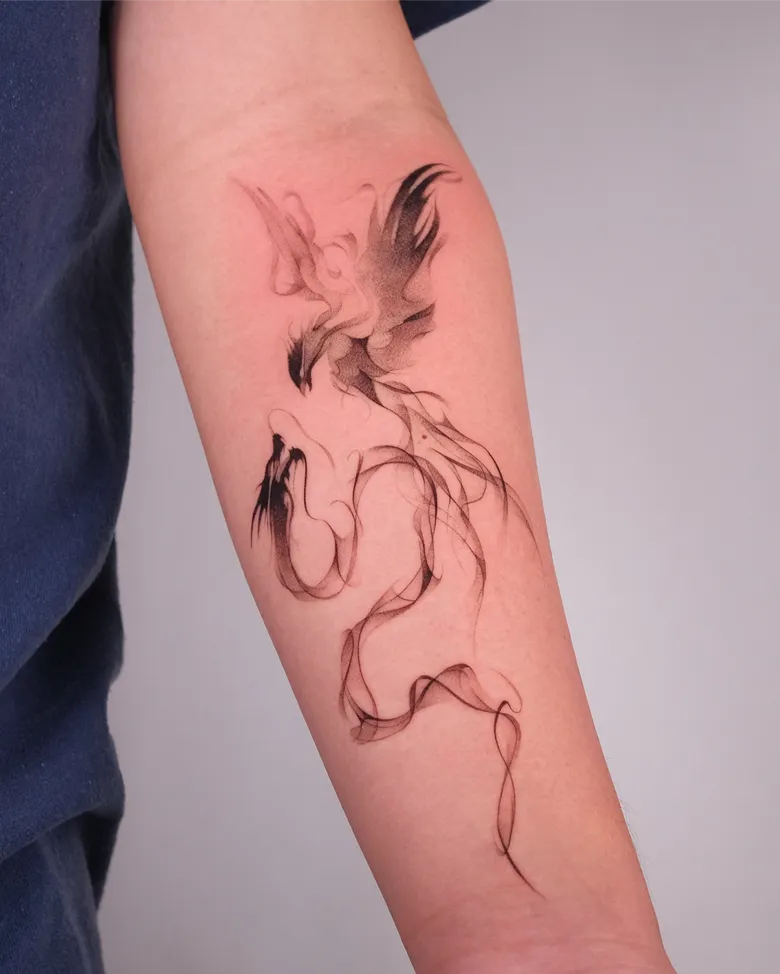 Smoke Trail Phoenix Forearm Tattoo