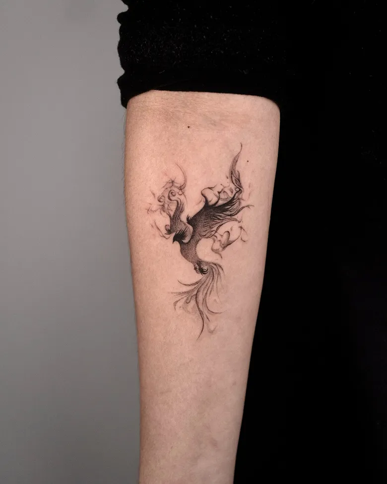 Smoky Abstract Phoenix Forearm Tattoo