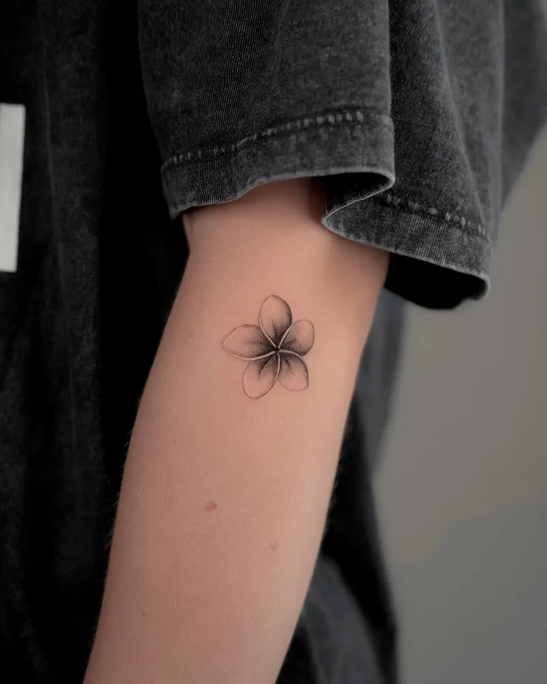 Smoky Black and Grey Plumeria Tattoo