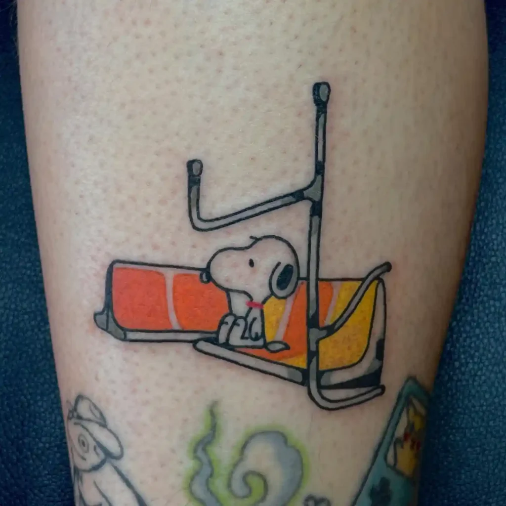 Snoopy Riding a Ski Lift on Lower Leg