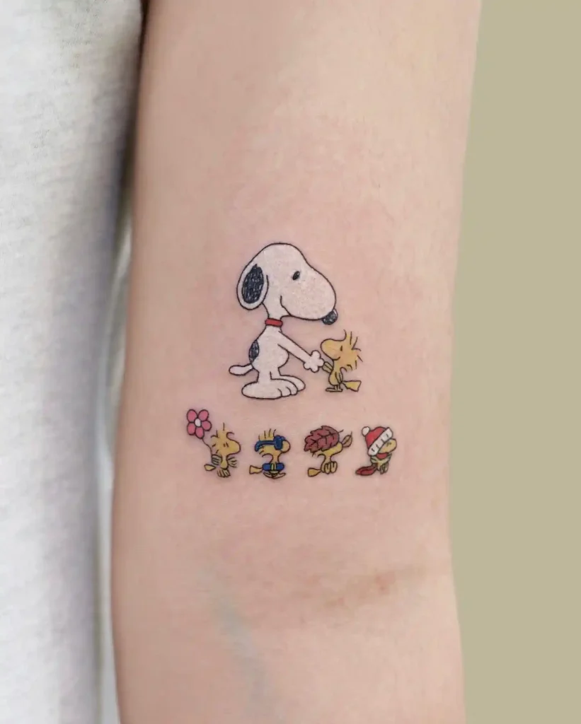 Snoopy and Woodstock Friendship on Inner Arm