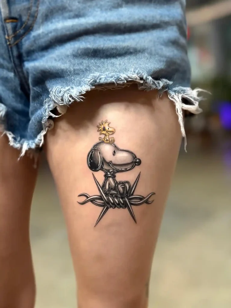Snoopy and Woodstock on Barbed Wire on Upper Thigh