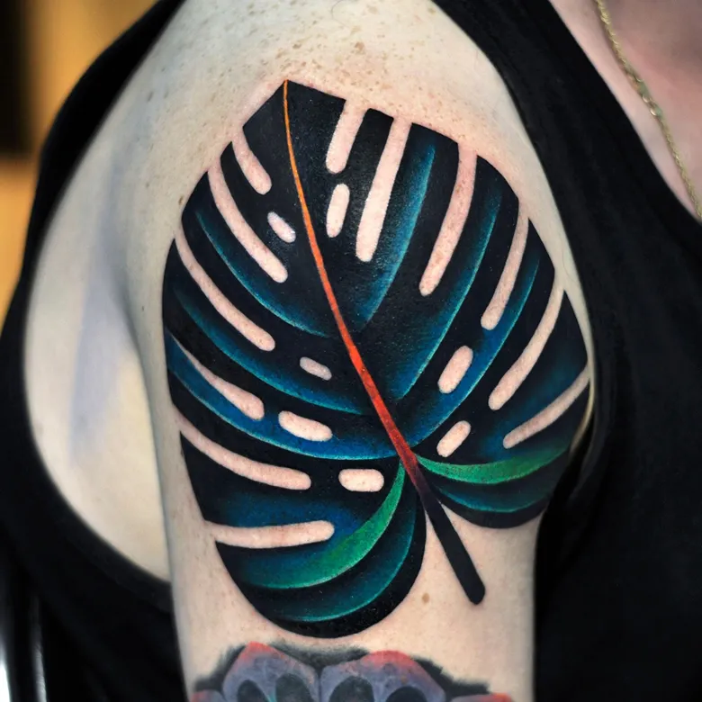 Striking Neon Monstera Leaf Tattoo