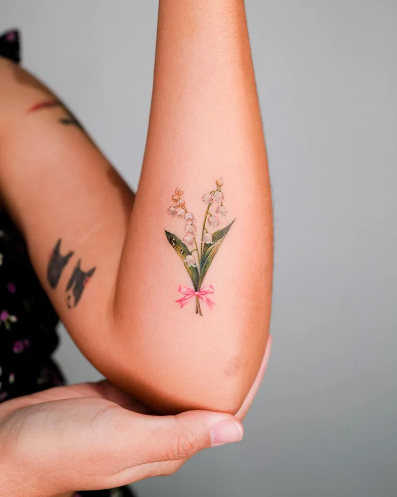 Stunning Lily of the Valley & Ribbon Tattoo