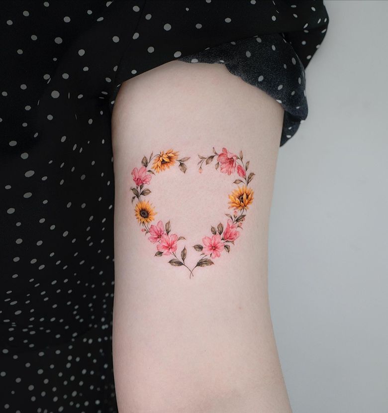 Sunflower and Blossom Wreath Thigh Tattoo