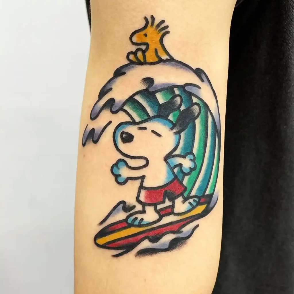 Surfing Snoopy and Woodstock Scene on Inner Arm