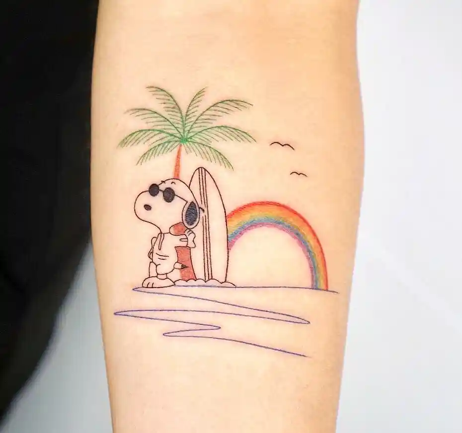 Surfing Snoopy with Rainbow and Palm Tree on Inner Arm