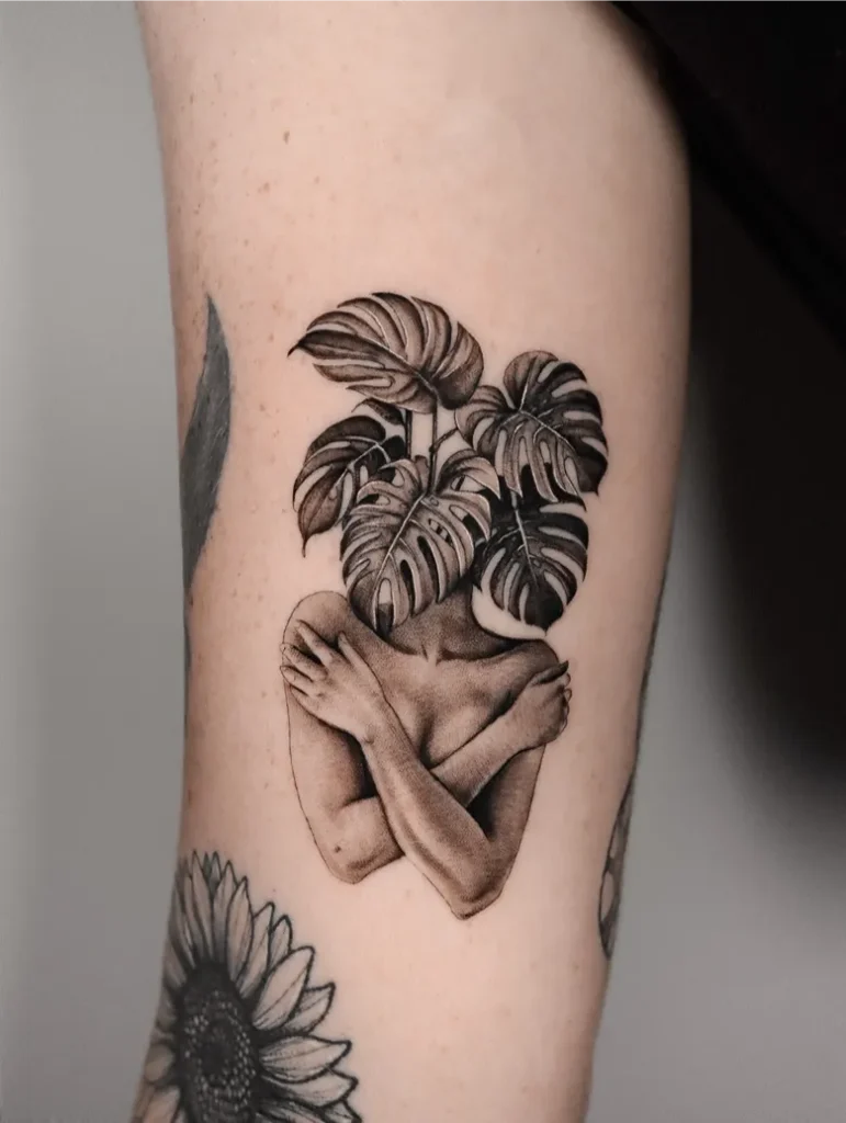 Surreal Human Figure Monstera Head Tattoo