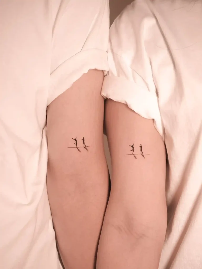 Tiny Dancing Silhouettes on Inner Forearm