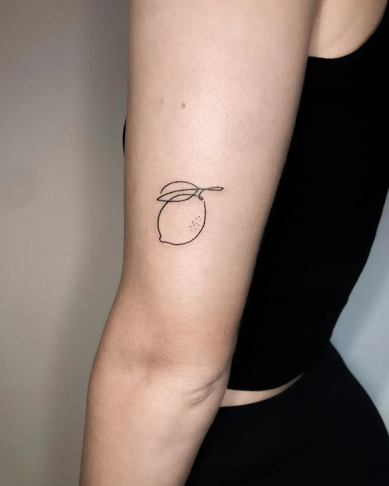 Tiny Single Lemon Outline Tattoo