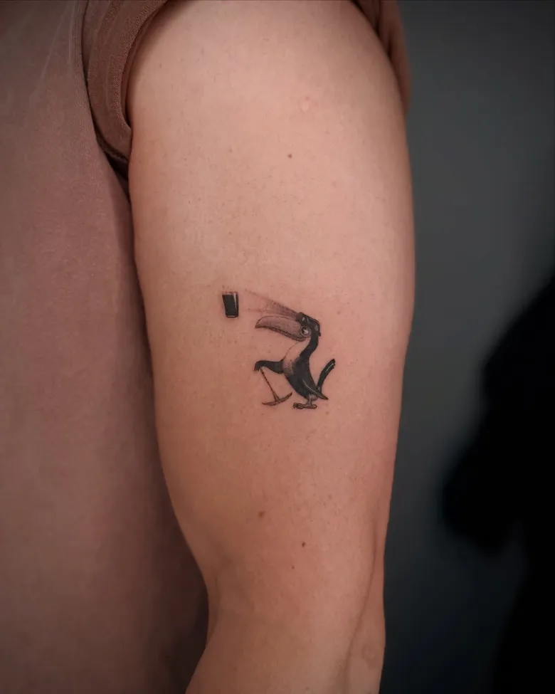 Tiny Toucan With Guinness Glass Tattoo