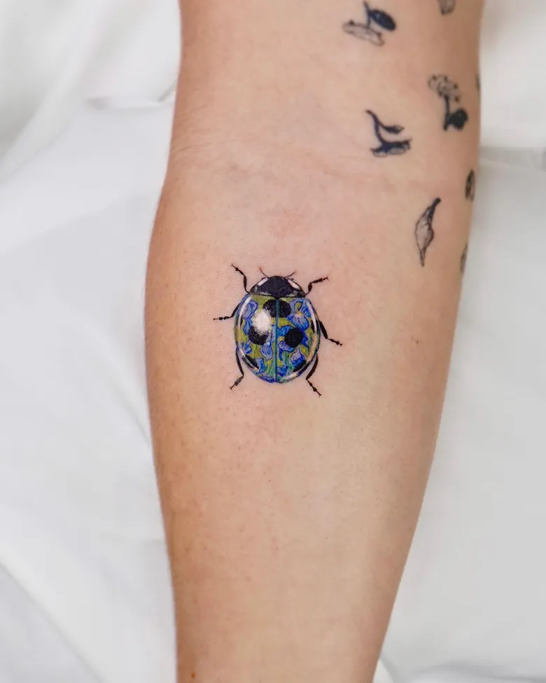 Van Gogh Inspired Ladybug Tattoo