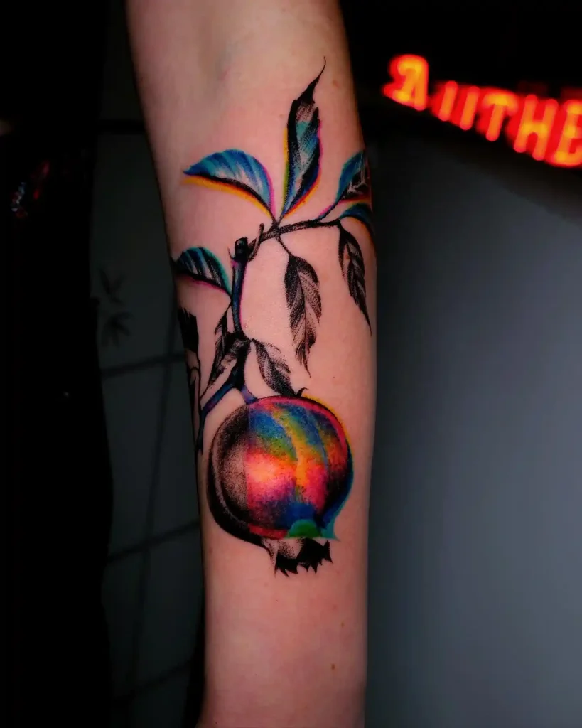 Vibrant Glitch Pomegranate on Forearm