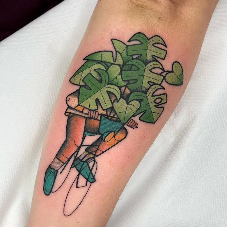 Whimsical Bicycle Ride Monstera Tattoo