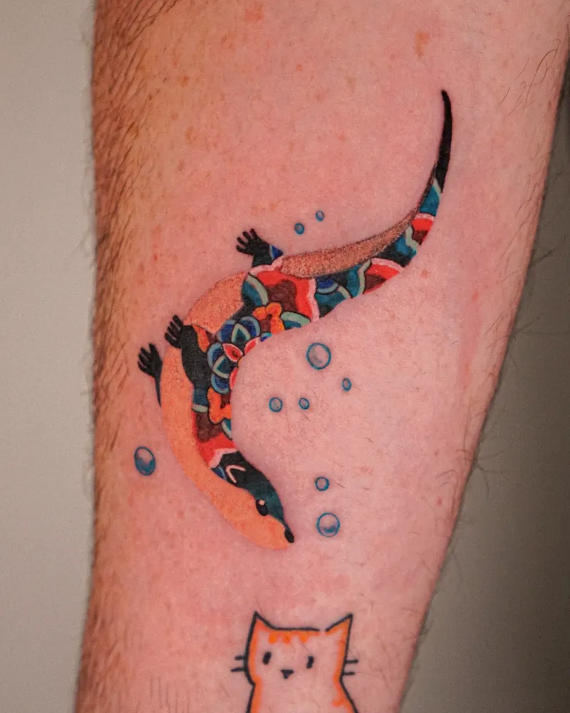 Abstract Patterned Floating Otter Tattoo