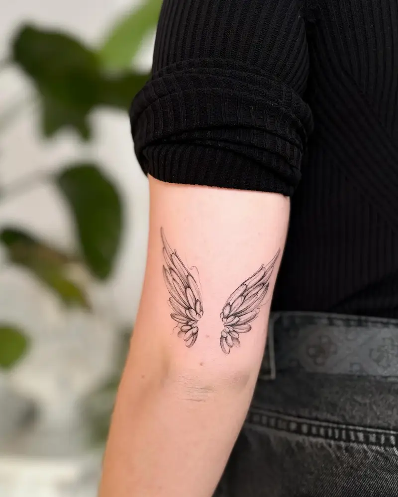 Airy Fine Line Mini Angel Wings Tattoo