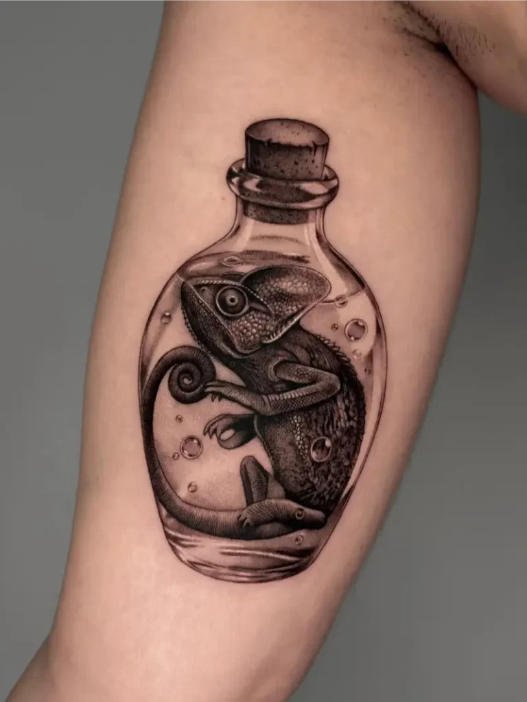 Black and Grey Chameleon In The Bottle Tattoo