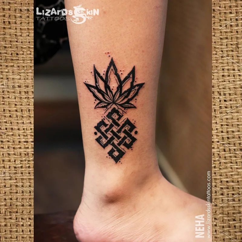 Blackwork Endless Knot And Pineapple Tattoo