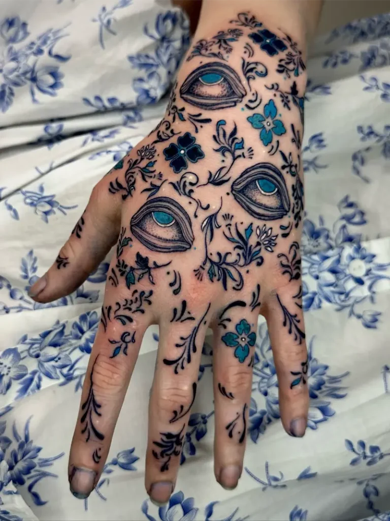 Blue Ornamental Eye Hand Tattoo