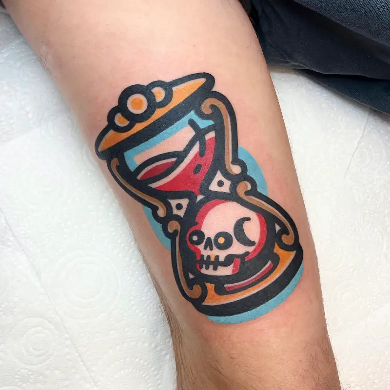 Bold Neo-Traditional Skull Hourglass Tattoo