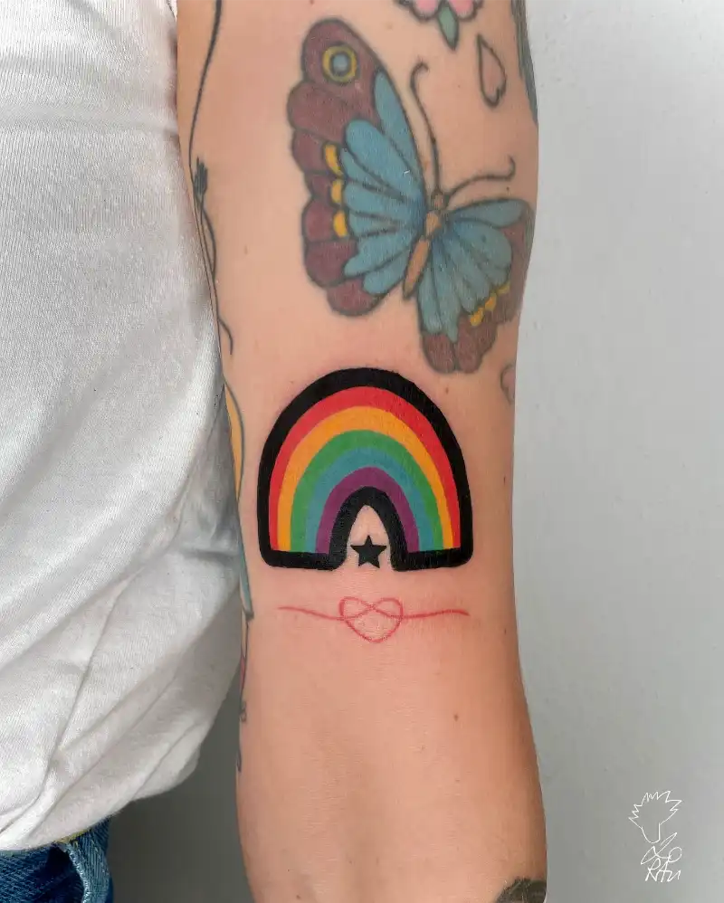 Bold Traditional Rainbow Tattoo