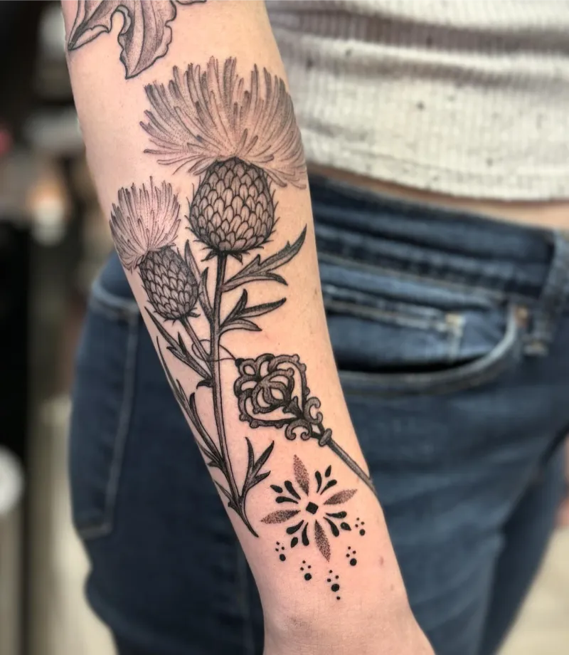 Botanical Blackwork Thistle Tattoo With Ornamental Key