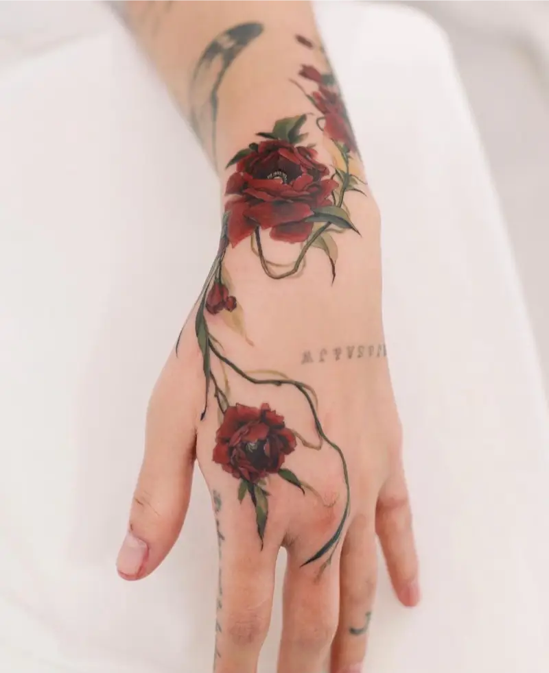 Botanical Realism Red Floral Hand Tattoo